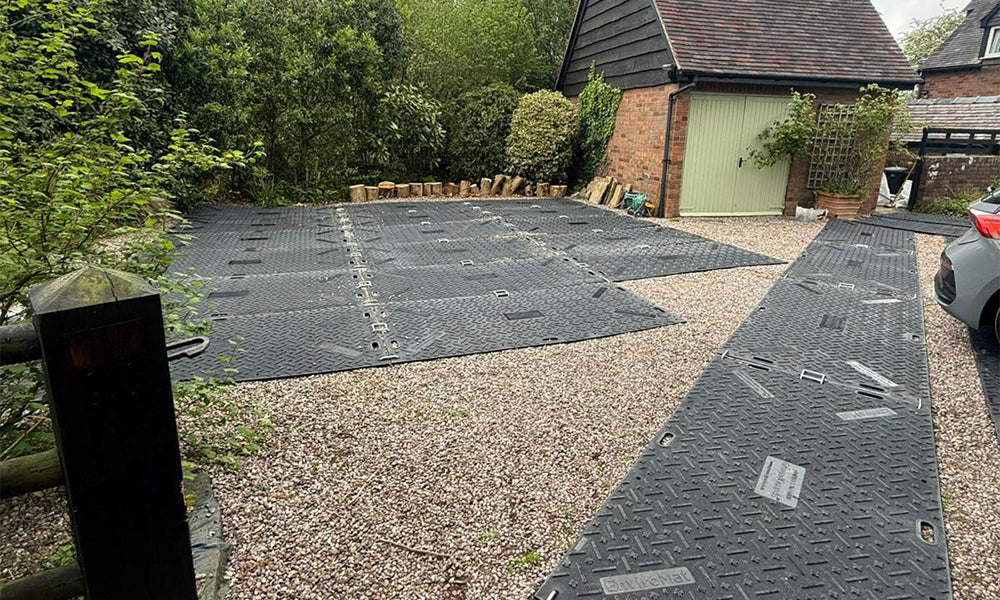 EnviroMat Protects Loose Stone Driveway During House Renovation