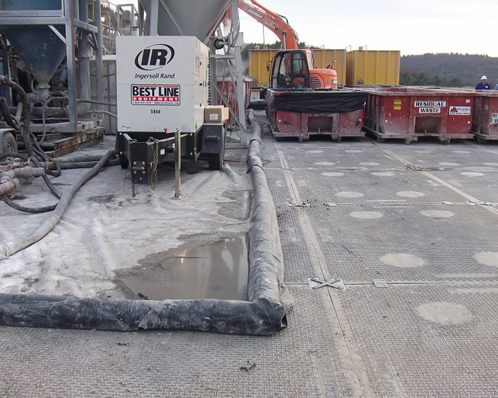 Concrete mixing plant and construction equipment on a construction site