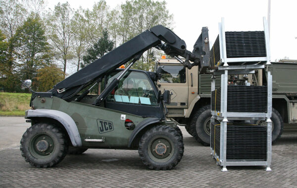 army military vehicle JCB loading mats into stillage