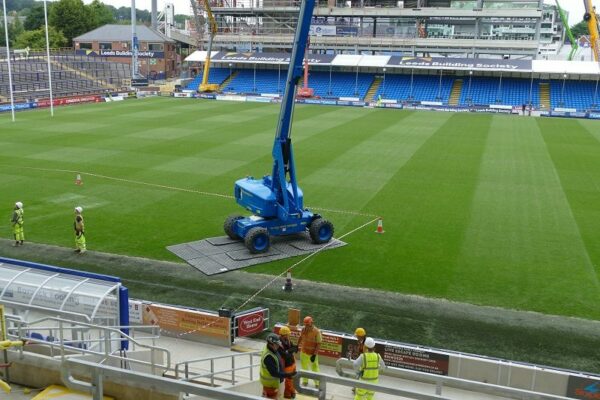 Mat hire at sports stadium for cherrypicker