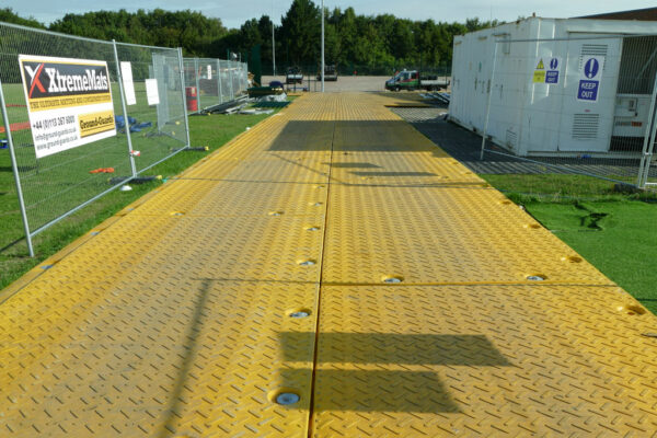 Temporary roadway at sports park field