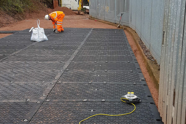 Temporary ground protection at railway station site