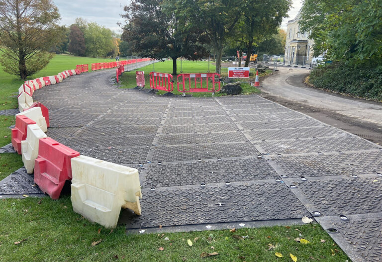 temporary road across public park field